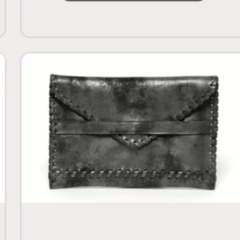 LAGGOS polka embossed Leather clutch black